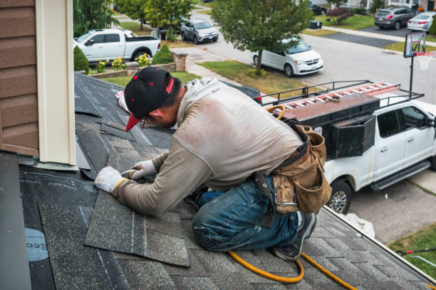 Professional Roof Replacement technician working in Negley, OH